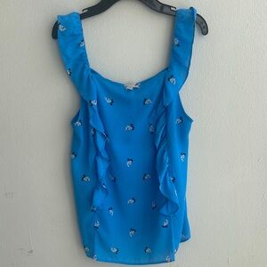 Pre-Loved LOFT Blue Floral Ruffle Top
Elevate your style this elegant blouse